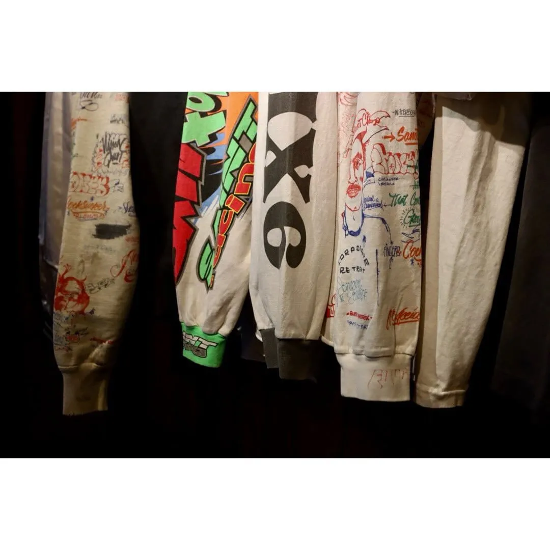 SAINT MICHAEL 24SS SAINT FORCE L/S TEE New Racing Retro Long Sleeve Off-white S-XL Front, left and right sleeves, even ribs are printed. There are more than 30 sets of samples in total. They are extremely complicated and all are oversized screen versions. Ready-made garments are washed and worn with Vintage value.